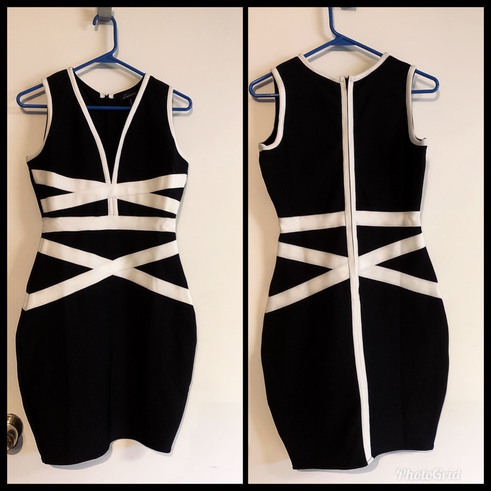 Black and white Dress with deep V neck.